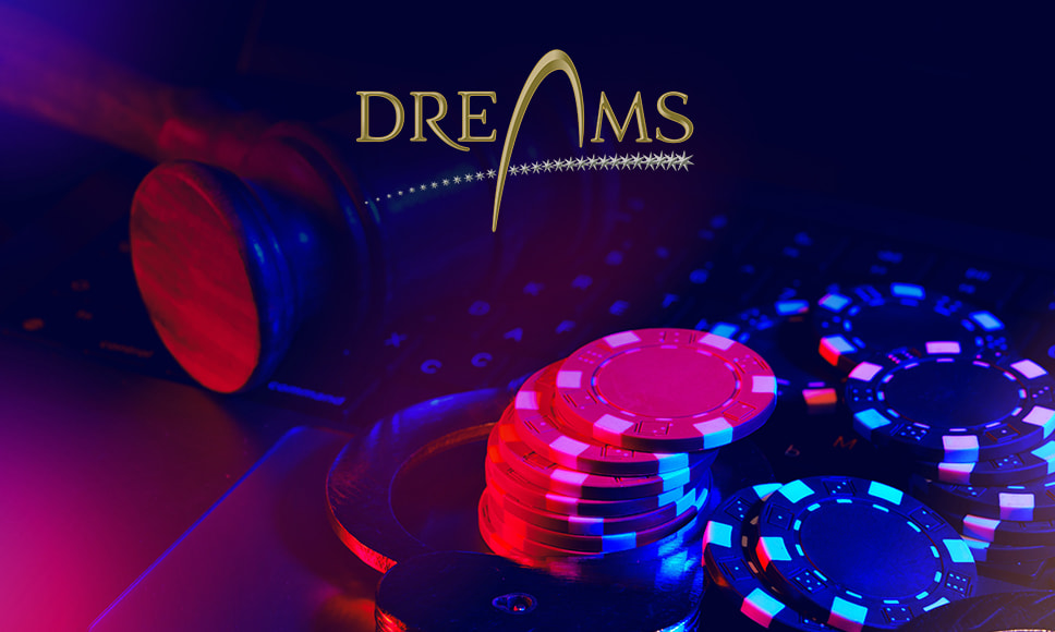 Logo del Grupo Dreams con fichas de casino.